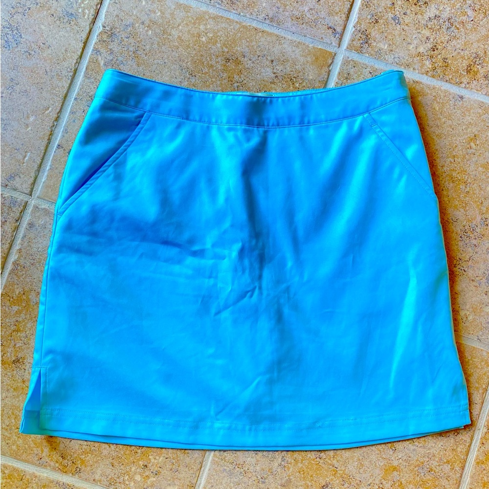 Greg Norman - Woman’s (Perfect Fit) aqua color sport skort, Size: 6